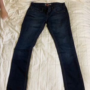 Buckle skinny jeans